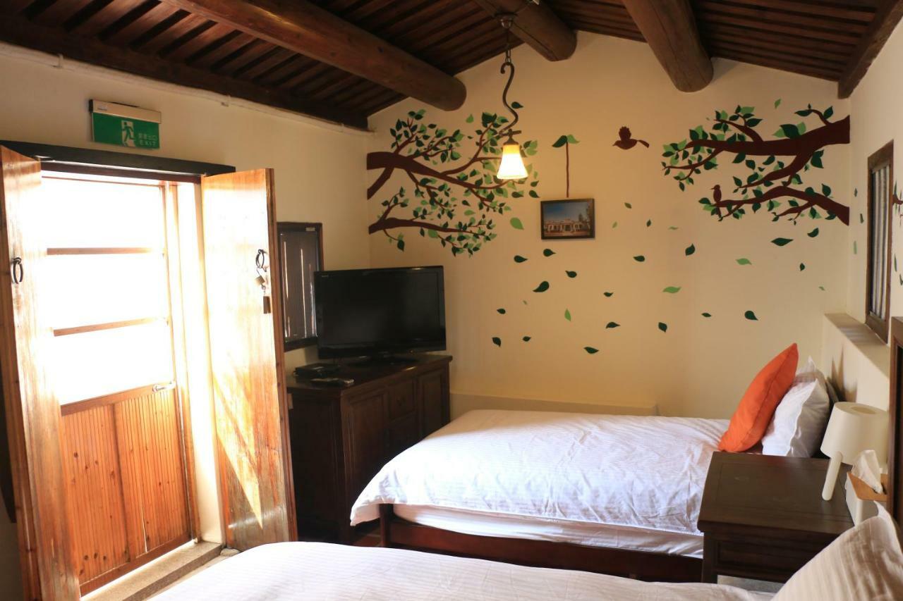 Longmen Inn Bed And Breakfast Jinning Exterior foto
